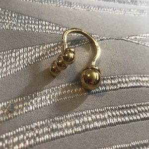 Funky gold tone ring